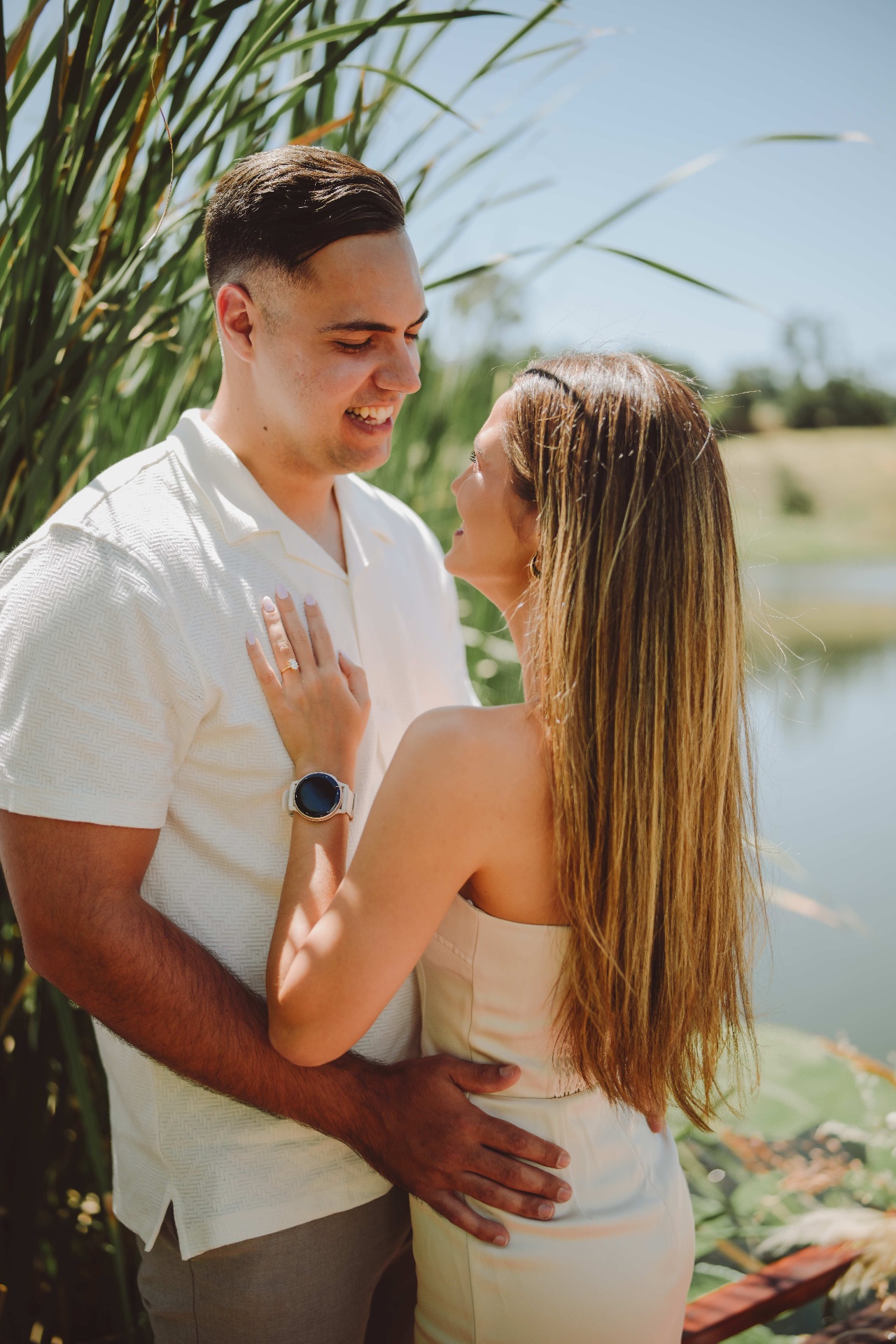 Inge's hand resting on Byron's chest, ring on her finger